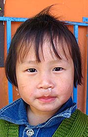 'A Tribal Child in a Kindergarden in Chiang Saen District' by Asienreisender